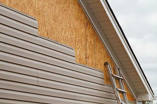Professional Siding Installation technician working in Syria, VA